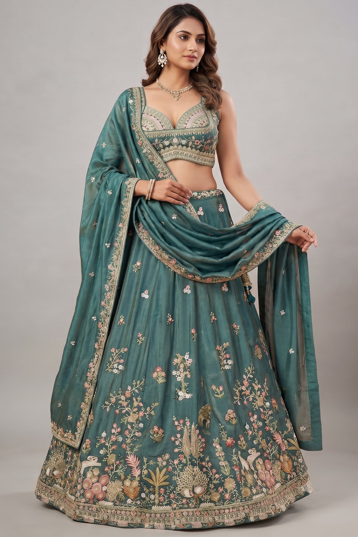 Deep Rama Tissue Lehenga Choli with Scenic Peacock & Animal Motif Embroidery Main image