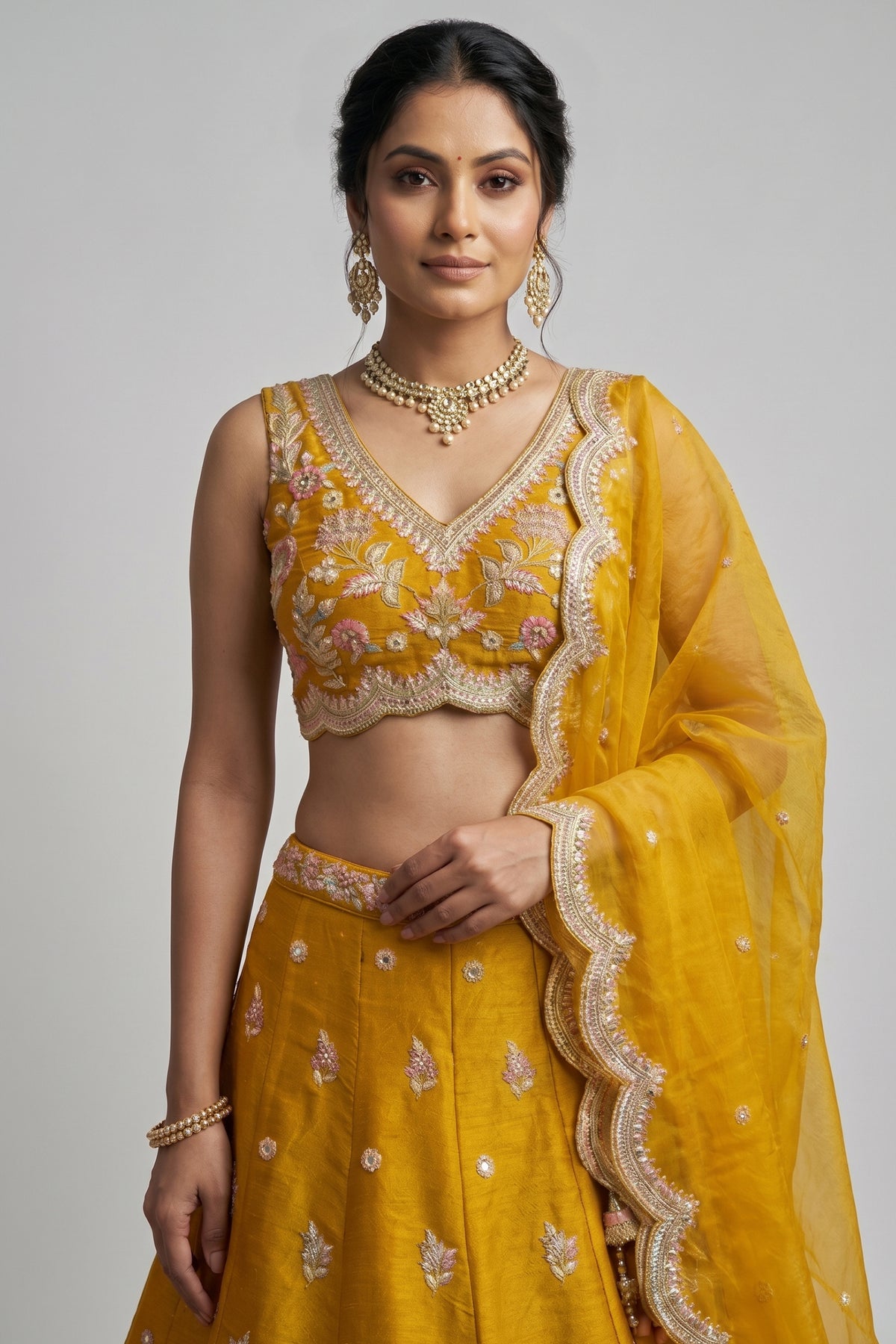 Mustard Tissue Lehenga Choli with Pastel Floral & Mirror Work