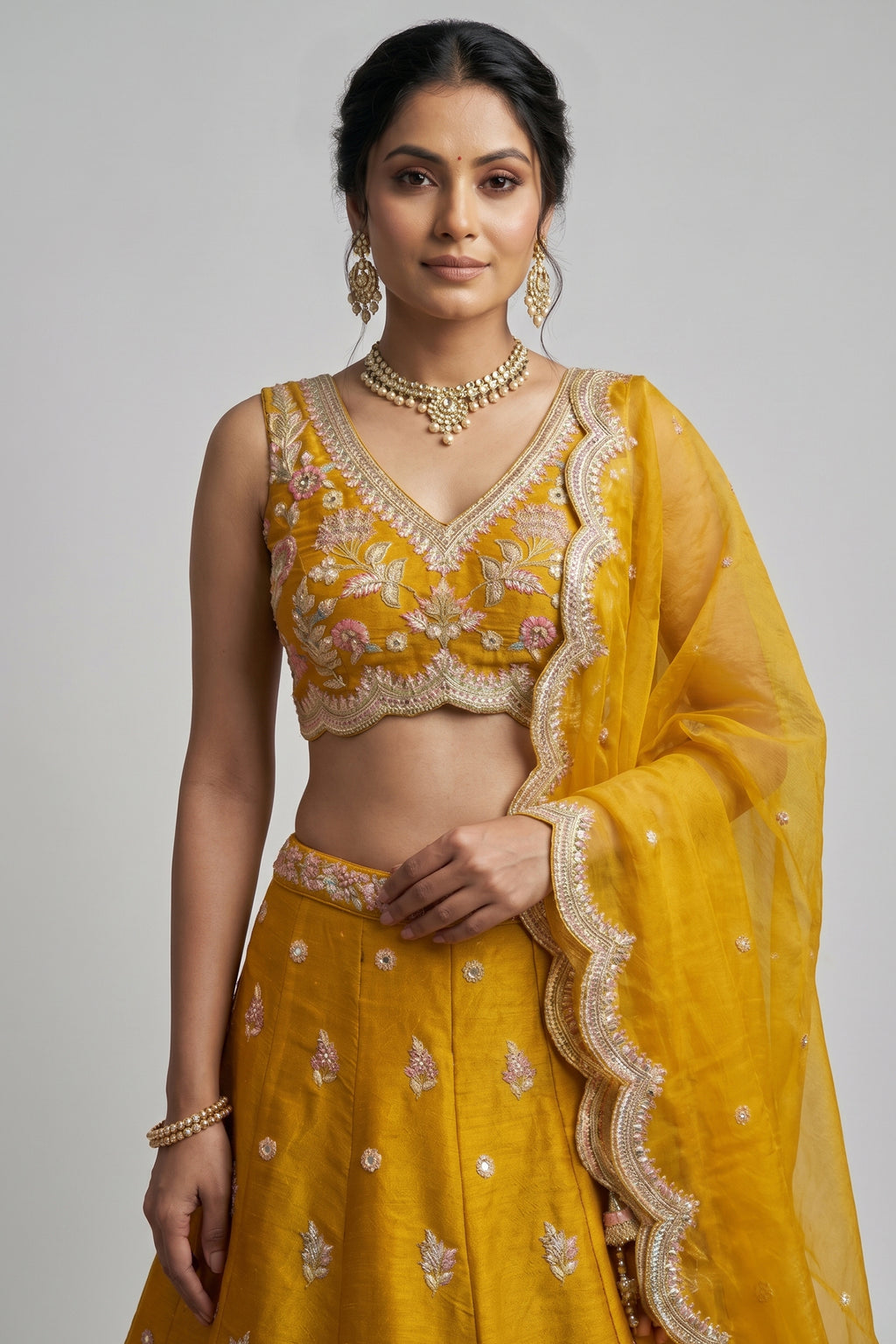 Mustard CorCholi-Cut Tissue Lehenga Choli with Pastel Floral & Mirror Work