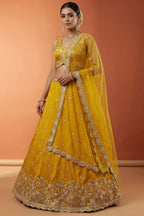 Vibrant Mustard Yellow Chinon Silk Lehenga Choli with Pearl & Sequin Woodland Motifs