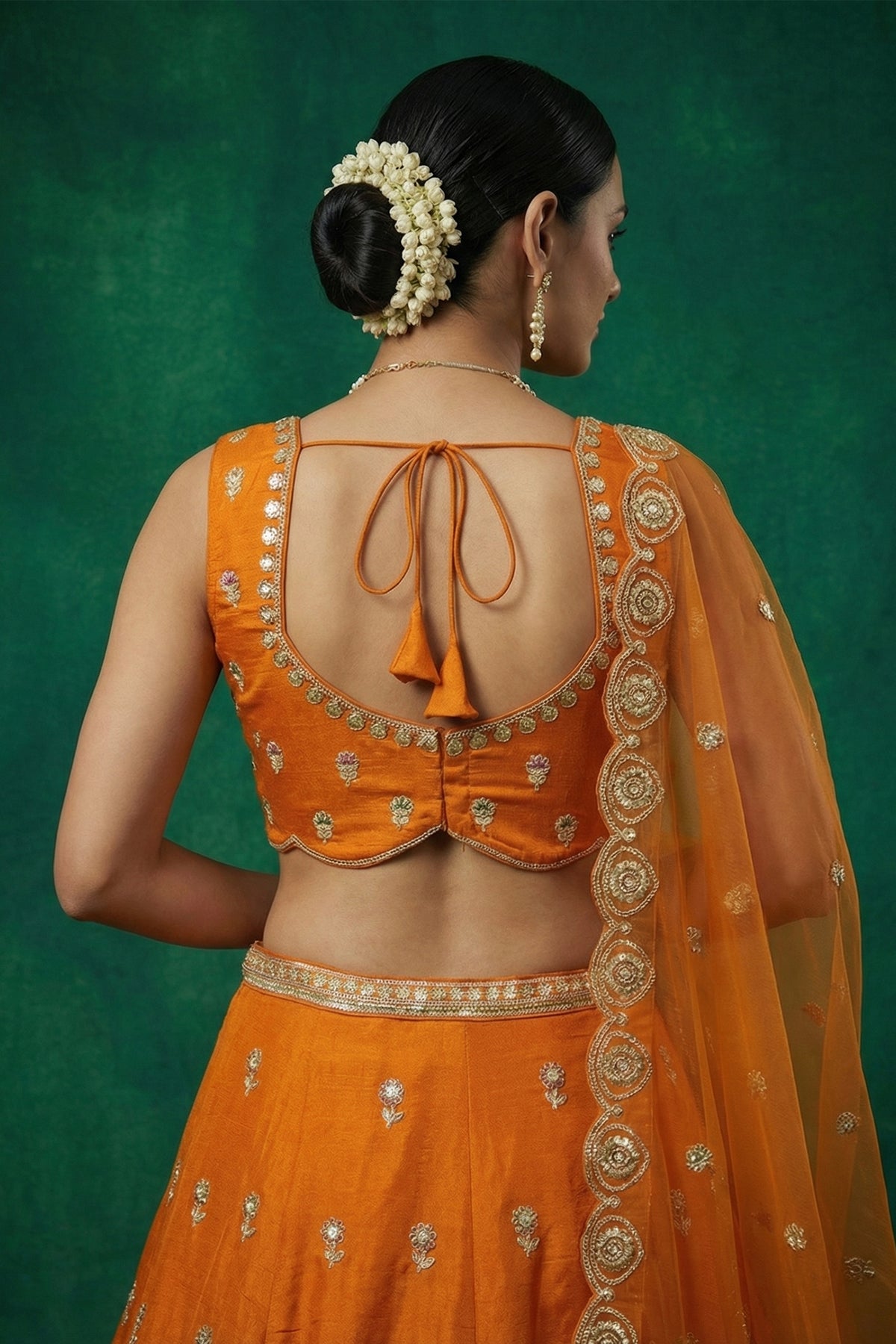 Orange Tissue Lehenga Choli with Scalloped Jharokha and Peacock Embroidery