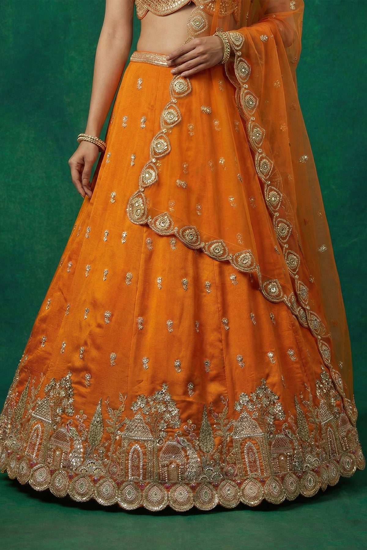 Orange Tissue Lehenga Choli with Scalloped Jharokha and Peacock Embroidery