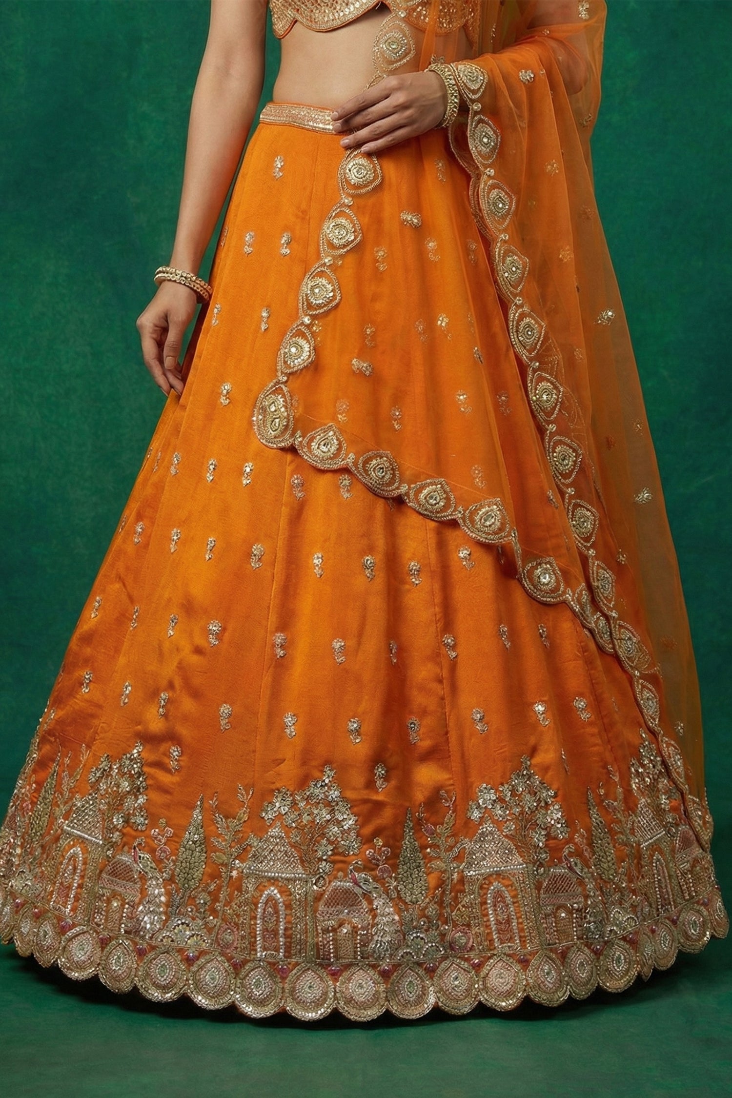 SunCholi Orange Tissue Lehenga Choli with Scalloped Jharokha and Peacock Embroidery