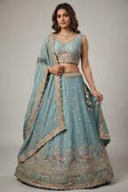 Light Turquoise Tissue Lehenga Choli with Elephant and Peacock Heritage Embroidery