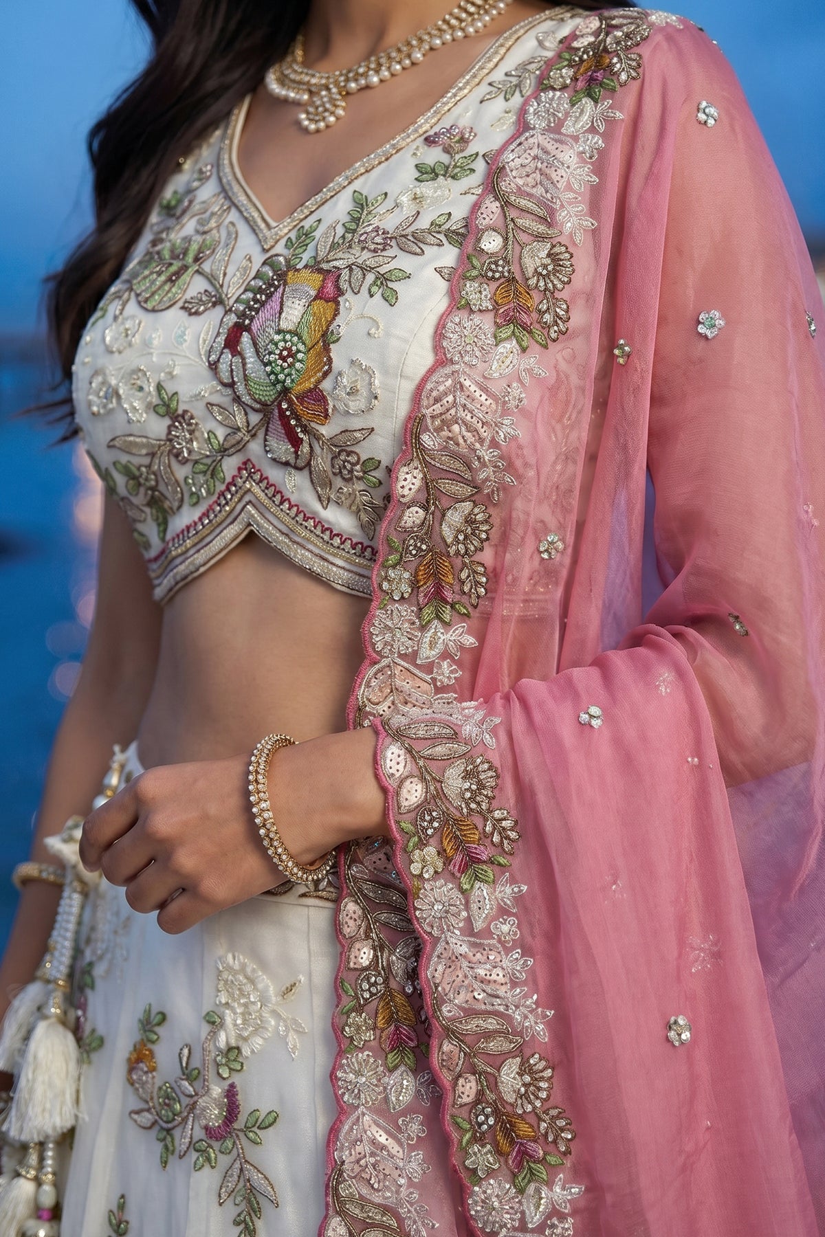Cream Tissue Lehenga Choli with Contrast Dupatta and Botanical Embroidery