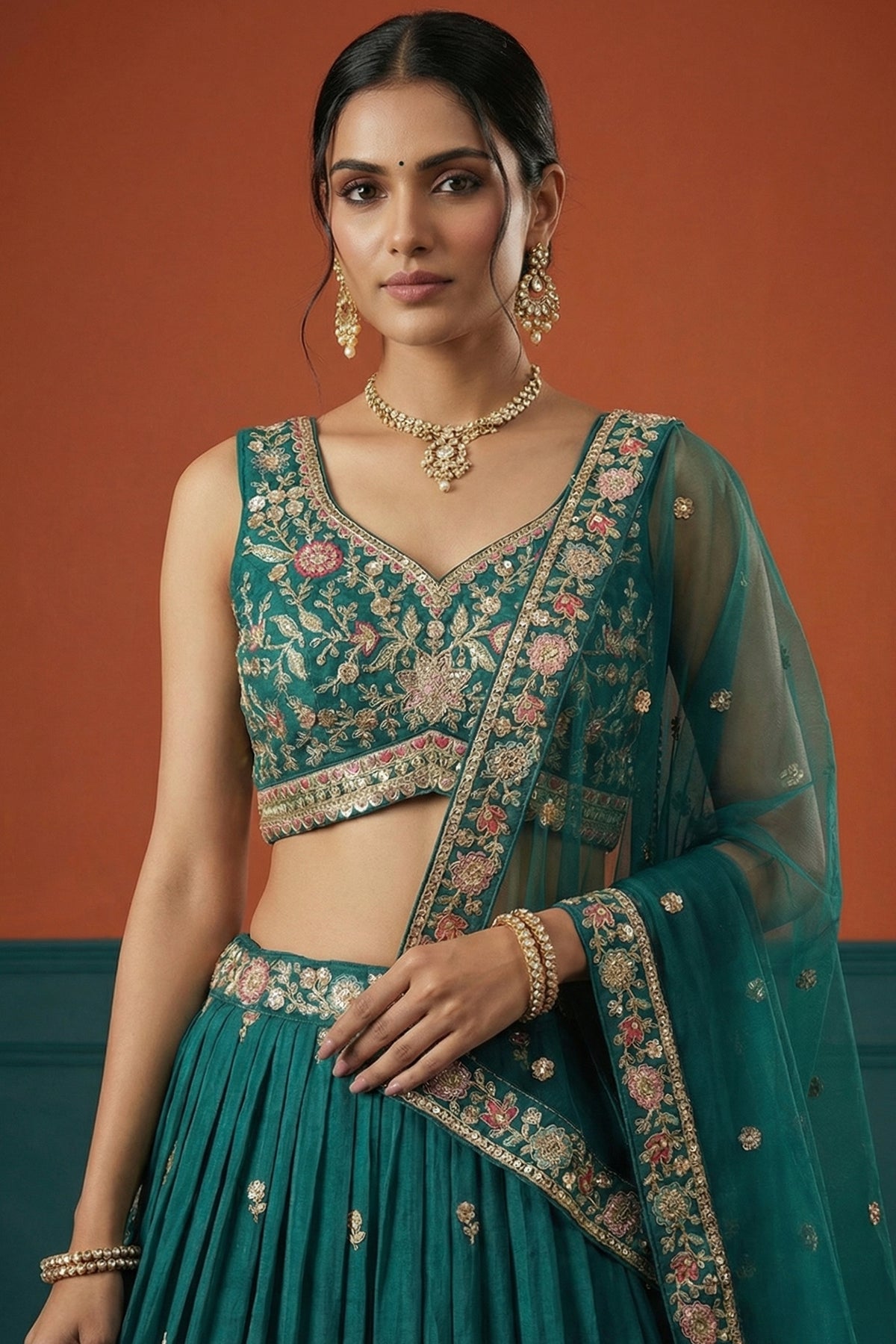 Rama Teal Pleated Georgette Lehenga Choli with Embroidered Hem