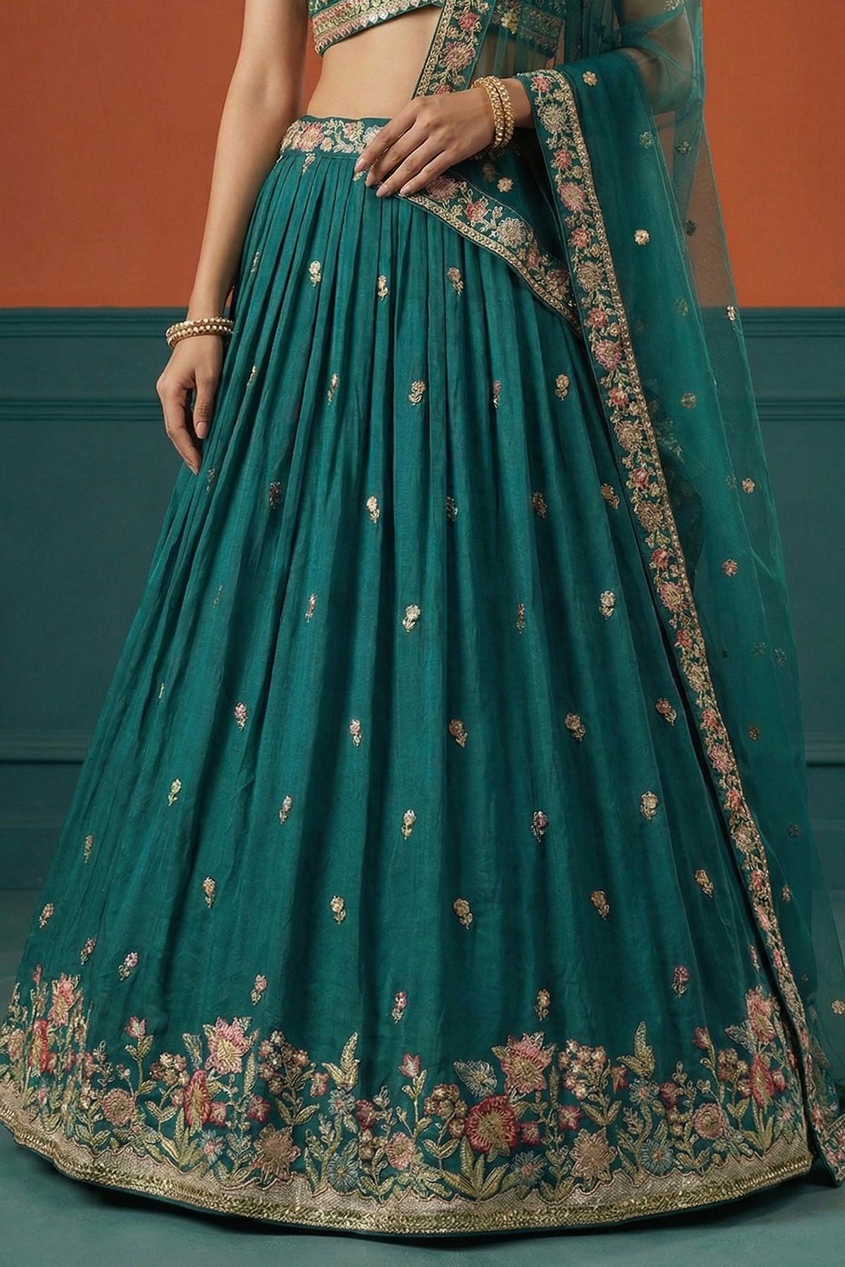 Rama Teal Pleated Georgette Lehenga Choli with Embroidered Hem