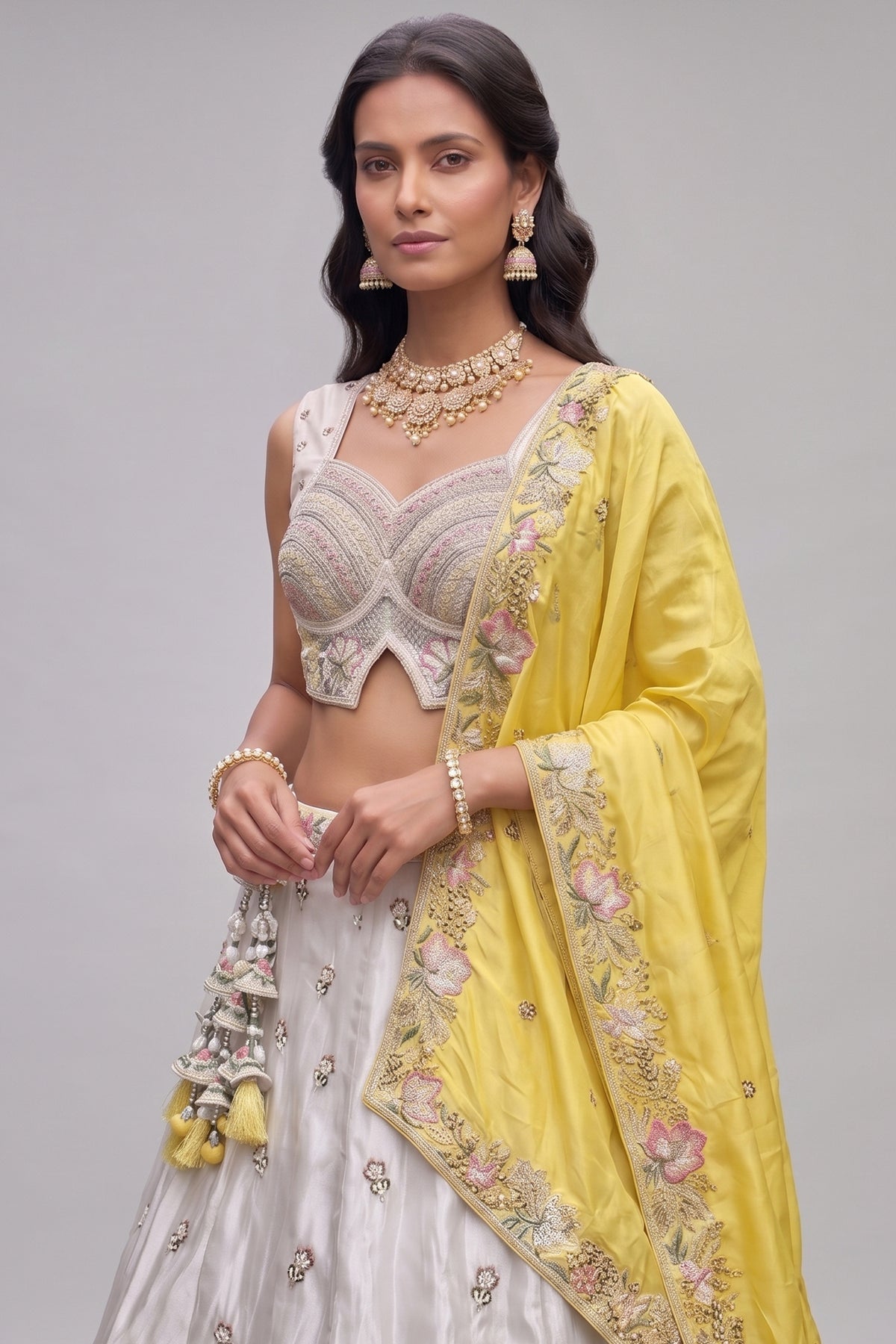 Off White Lehenga Choli with Floral Embroidered Border