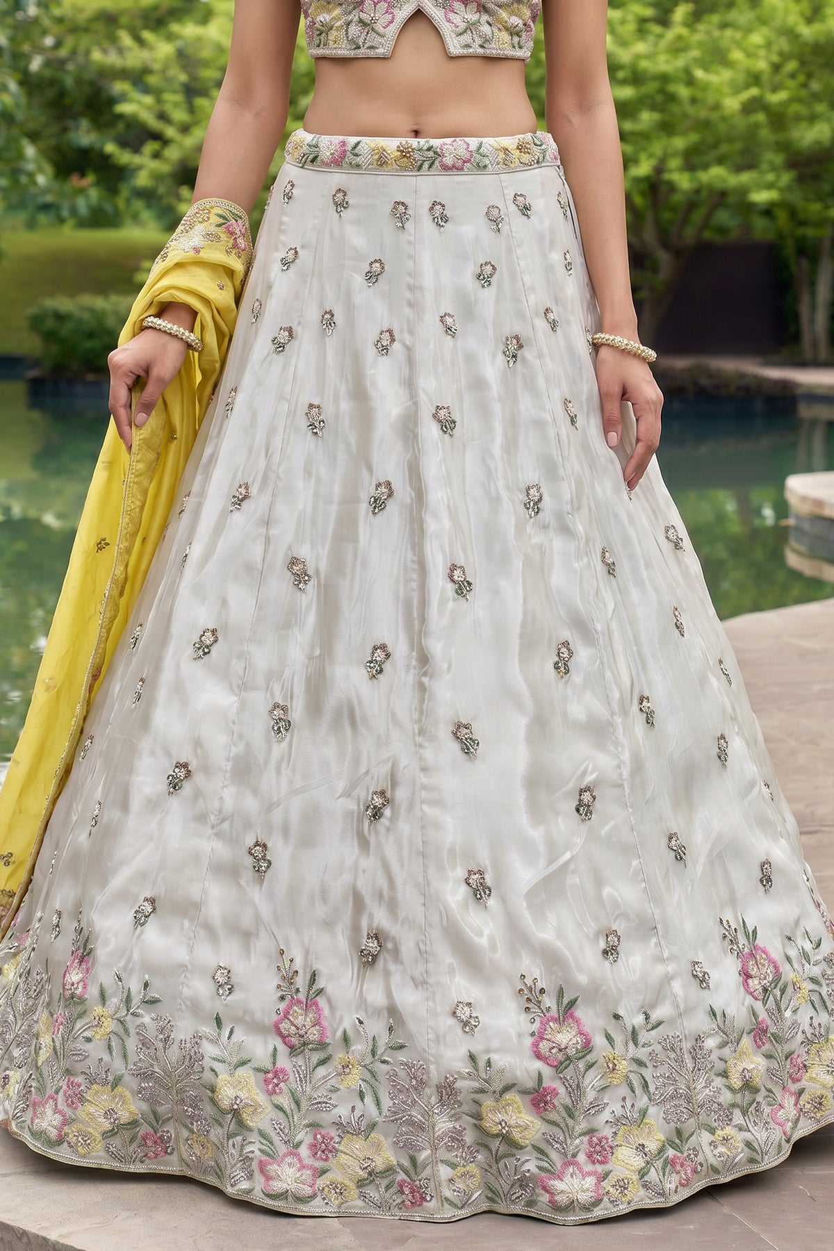Off White Lehenga Choli with Floral Embroidered Border