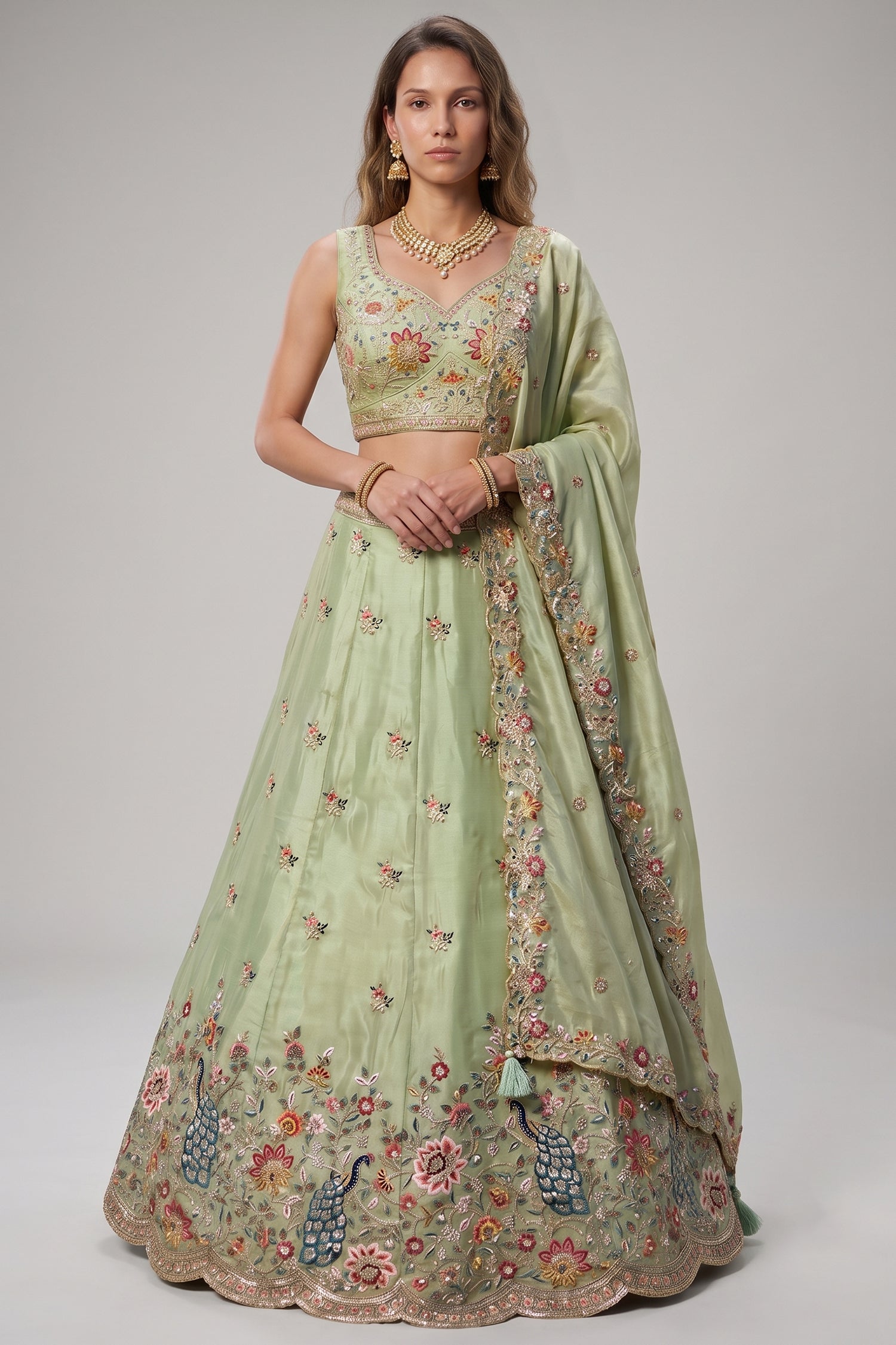 Pista Green Lehenga Choli with Peacock Floral Border