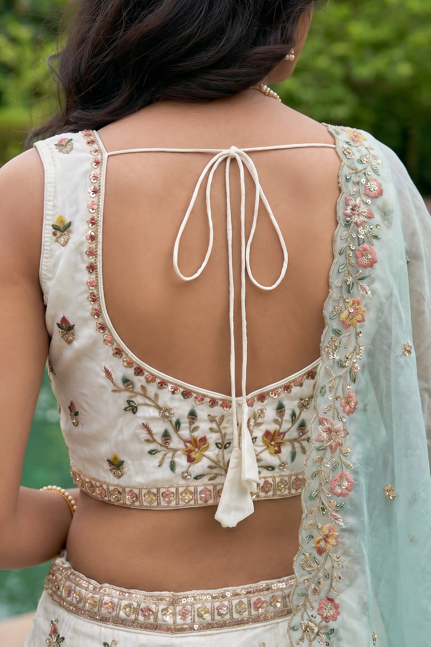 Off White Lehenga Choli with Peacock Floral Border