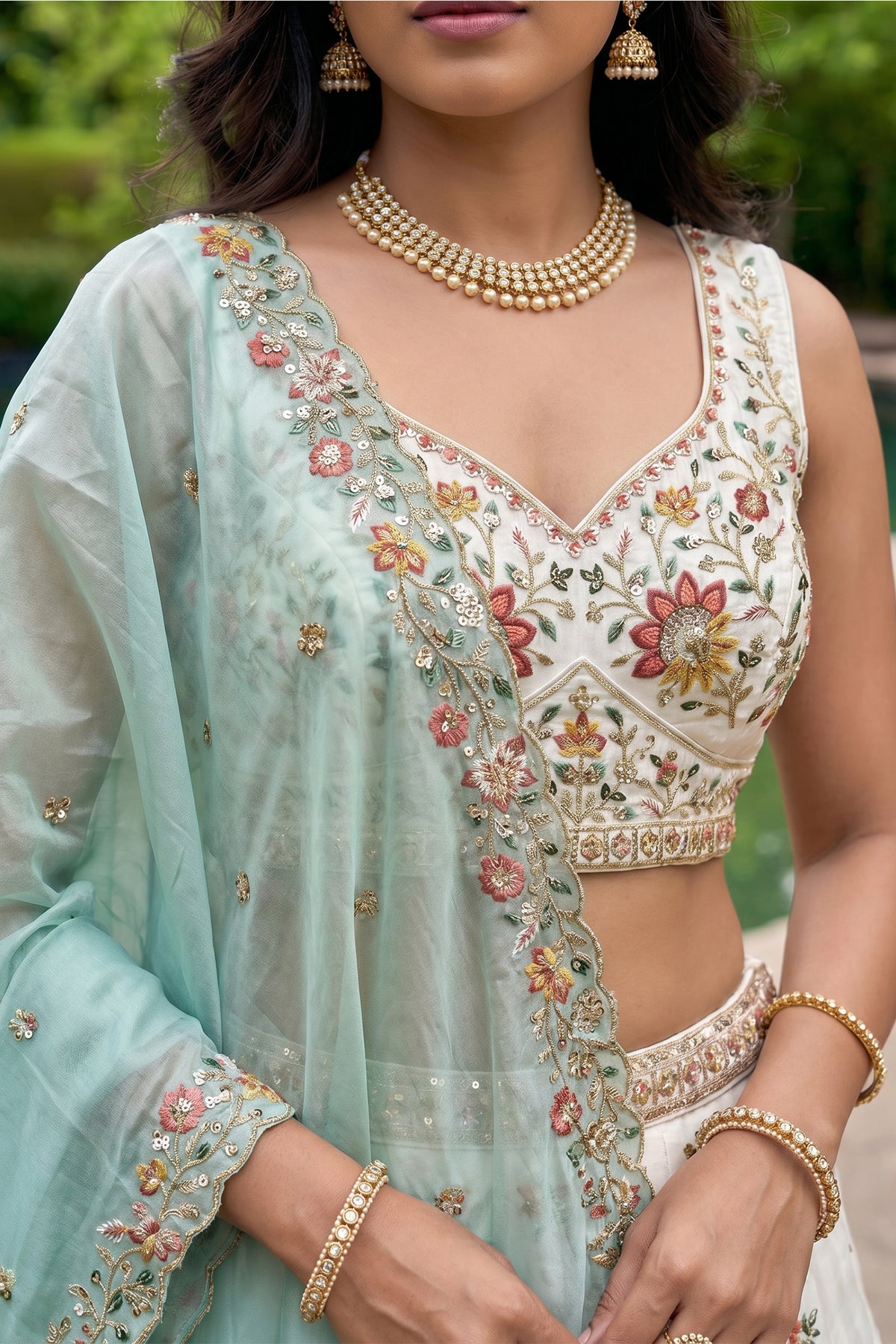 Off White Lehenga Choli with Peacock Floral Border