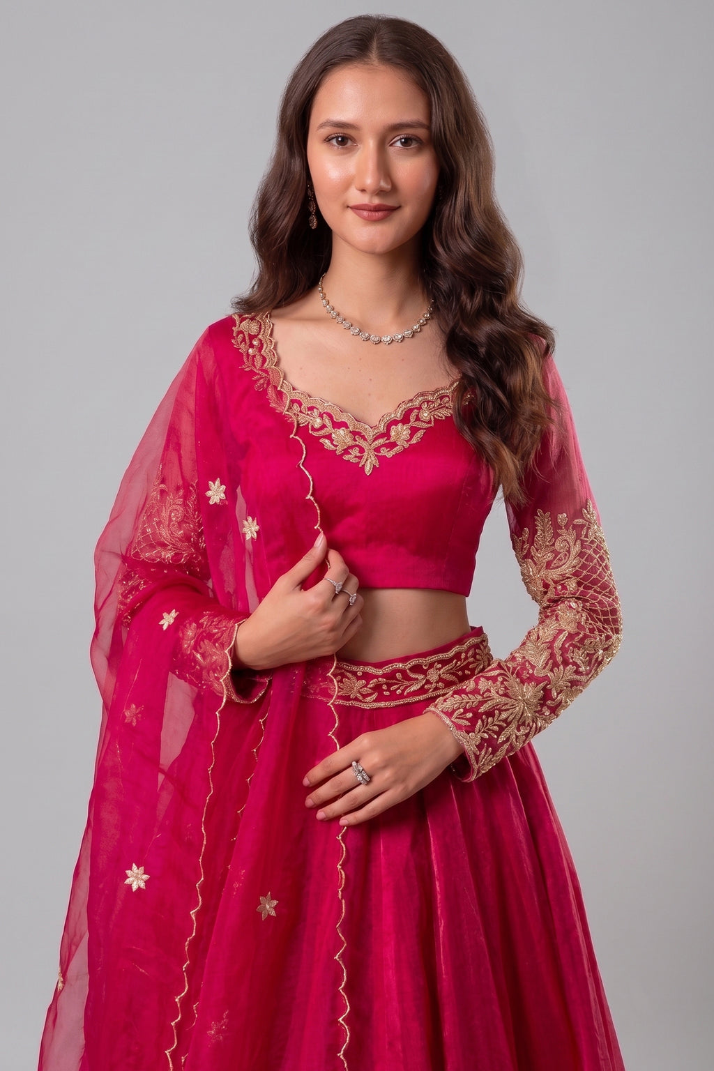 Rani Pink Organza Embroidered Lehenga Choli with Gold Border