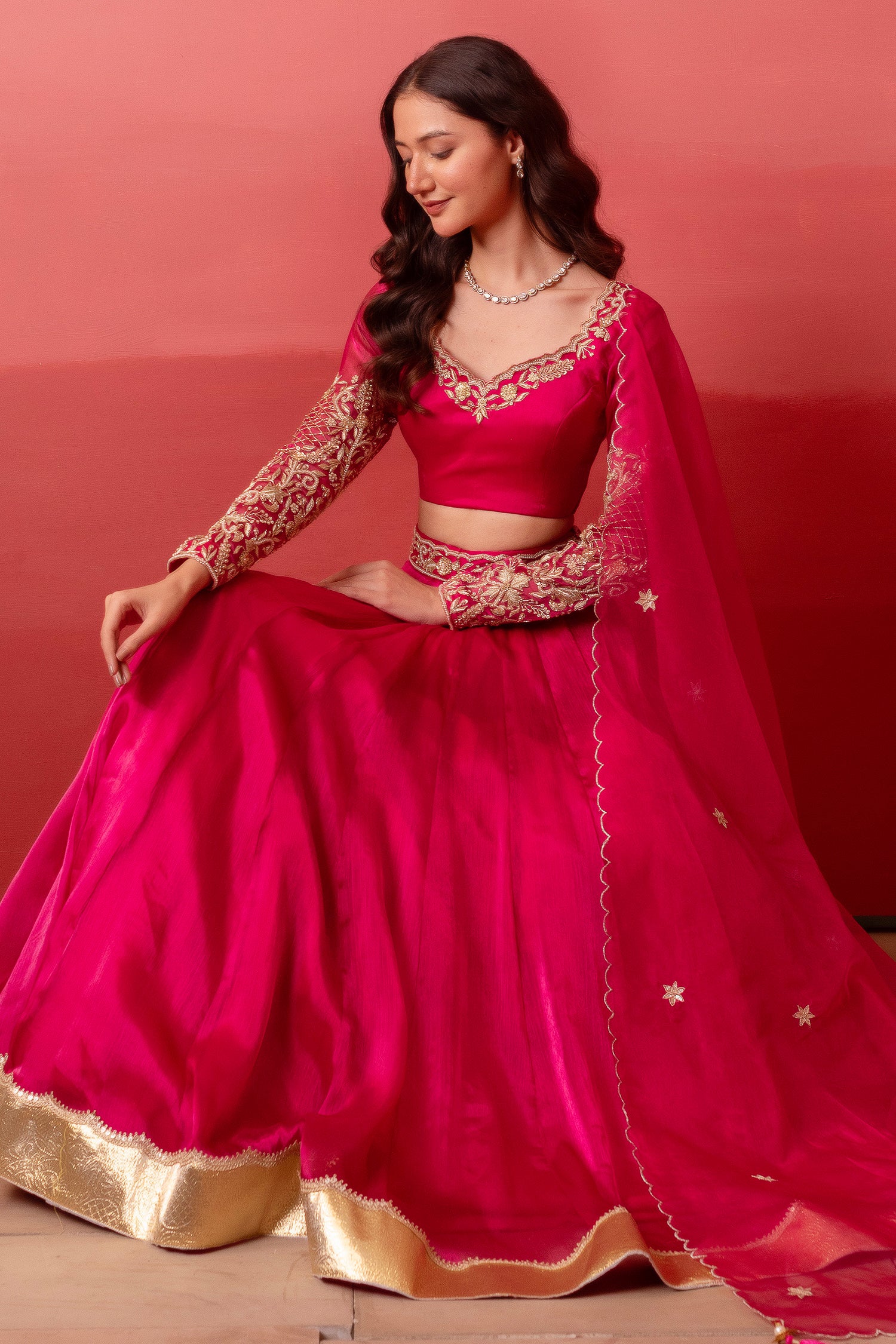 Rani Pink Organza Embroidered Lehenga Choli with Gold Border