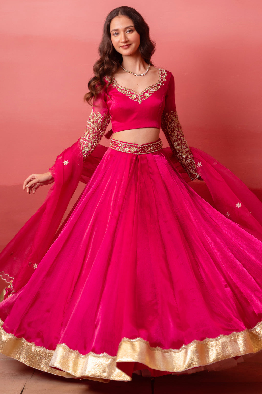 Rani Pink Organza Embroidered Lehenga Choli with Gold Border