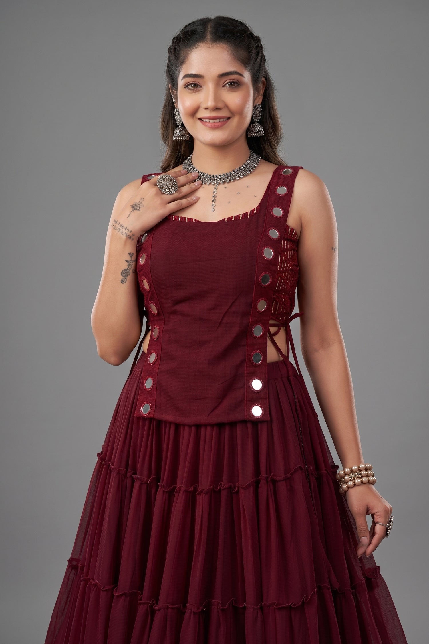 Maroon Georgette Tiered Mirror Work Koti Lehenga Set Secondary image