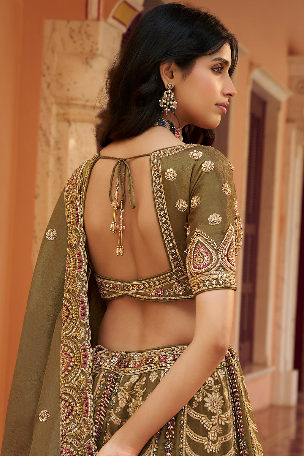 Olive Green Banarasi Silk Lehenga Enriched with Antique Zari Weaving