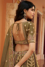 Olive Green Banarasi Silk Lehenga Enriched with Antique Zari Weaving