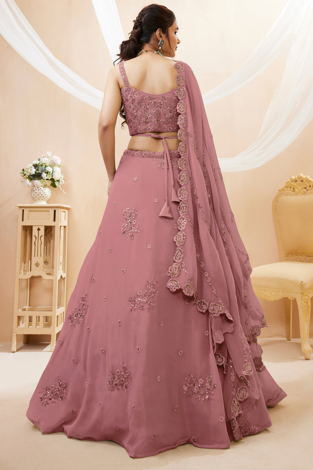 Peach Georgette Lehenga Choli featuring Intricate Zari, Sequins & Dori Work