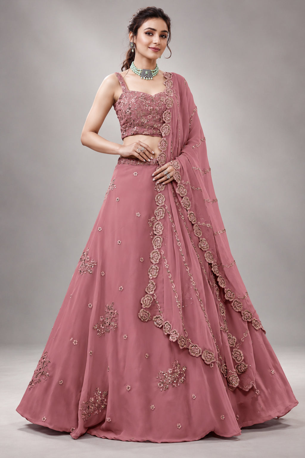 Peach Georgette Lehenga Choli featuring Intricate Zari, Sequins & Dori Work