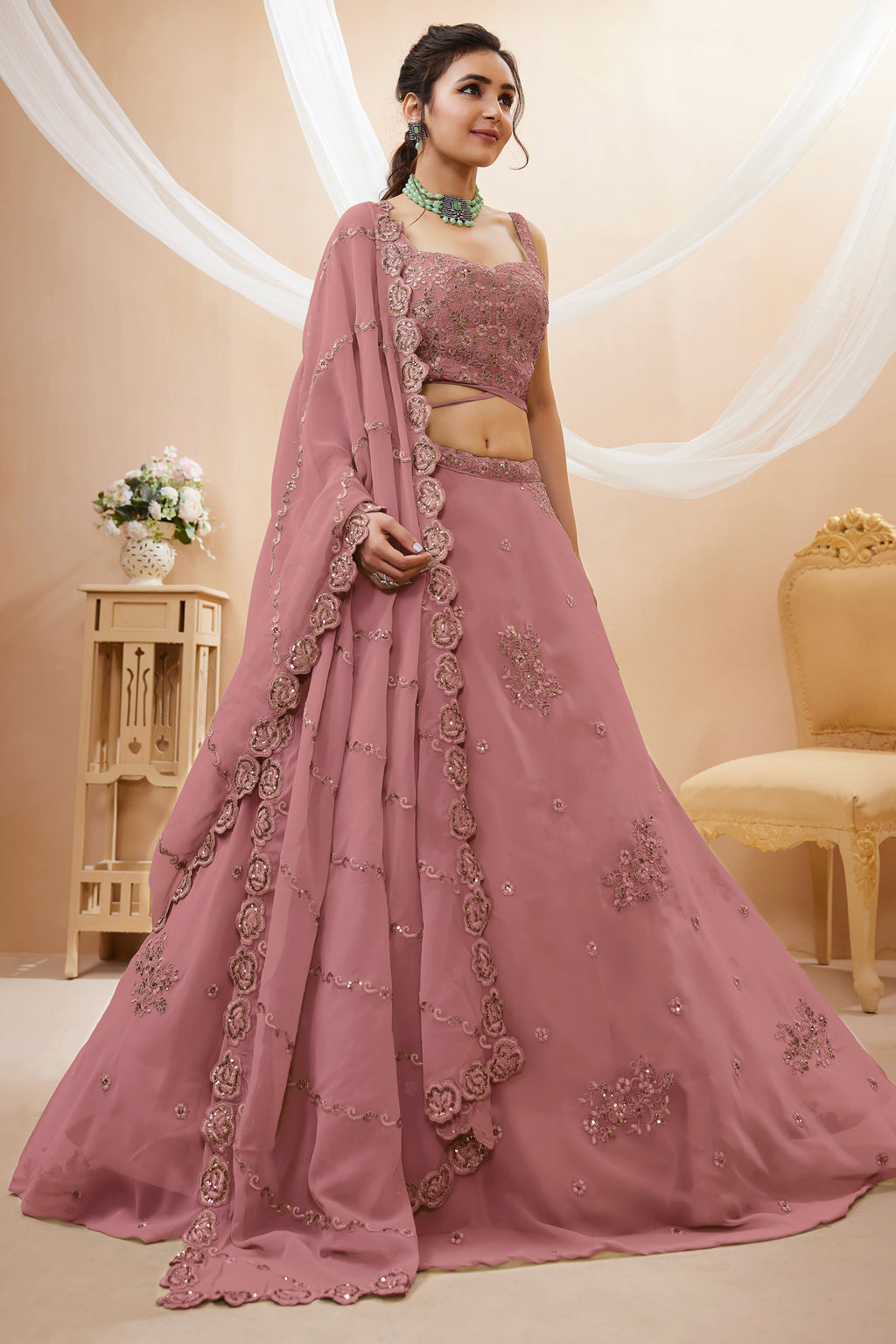 Peach Georgette Lehenga Choli featuring Intricate Zari, Sequins & Dori Work