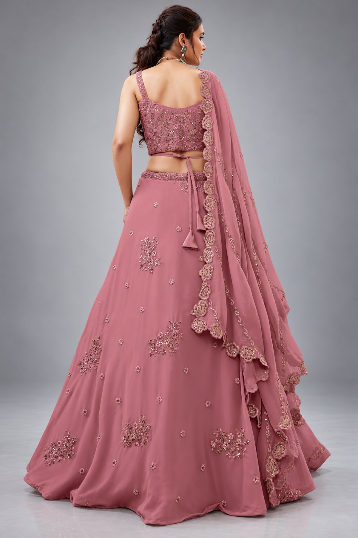 Peach Georgette Lehenga Choli featuring Intricate Zari, Sequins & Dori Work