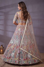Soft Lilac Net Lehenga Choli with Pastel Floral Thread Work & Sequins Accent