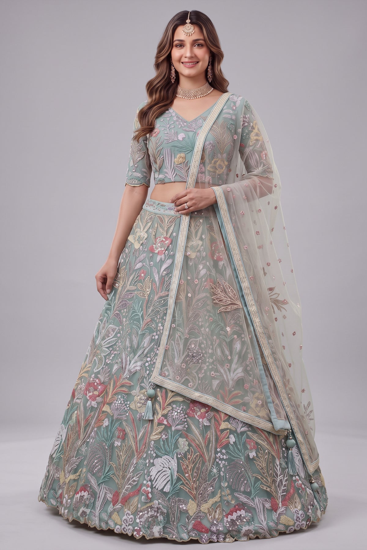 Ice Sky Blue Soft Net Lehenga Choli highlighted with Multi-Color Botanical Embroidery