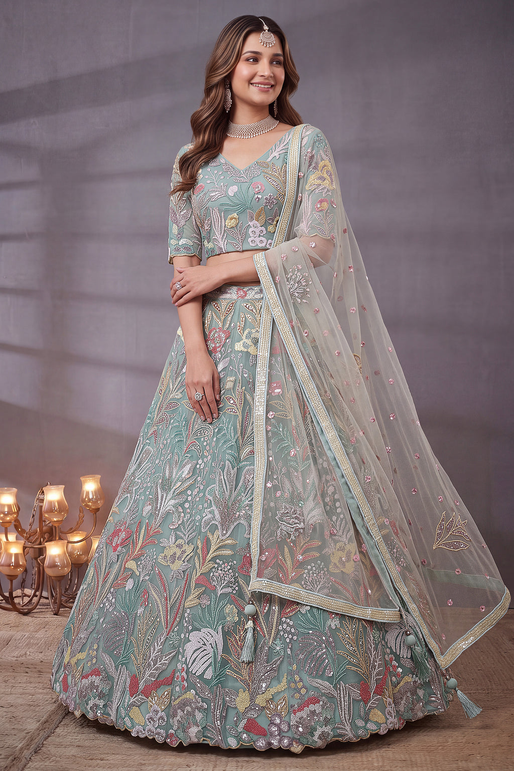 Ice Sky Blue Soft Net Lehenga Choli highlighted with Multi-Color Botanical Embroidery