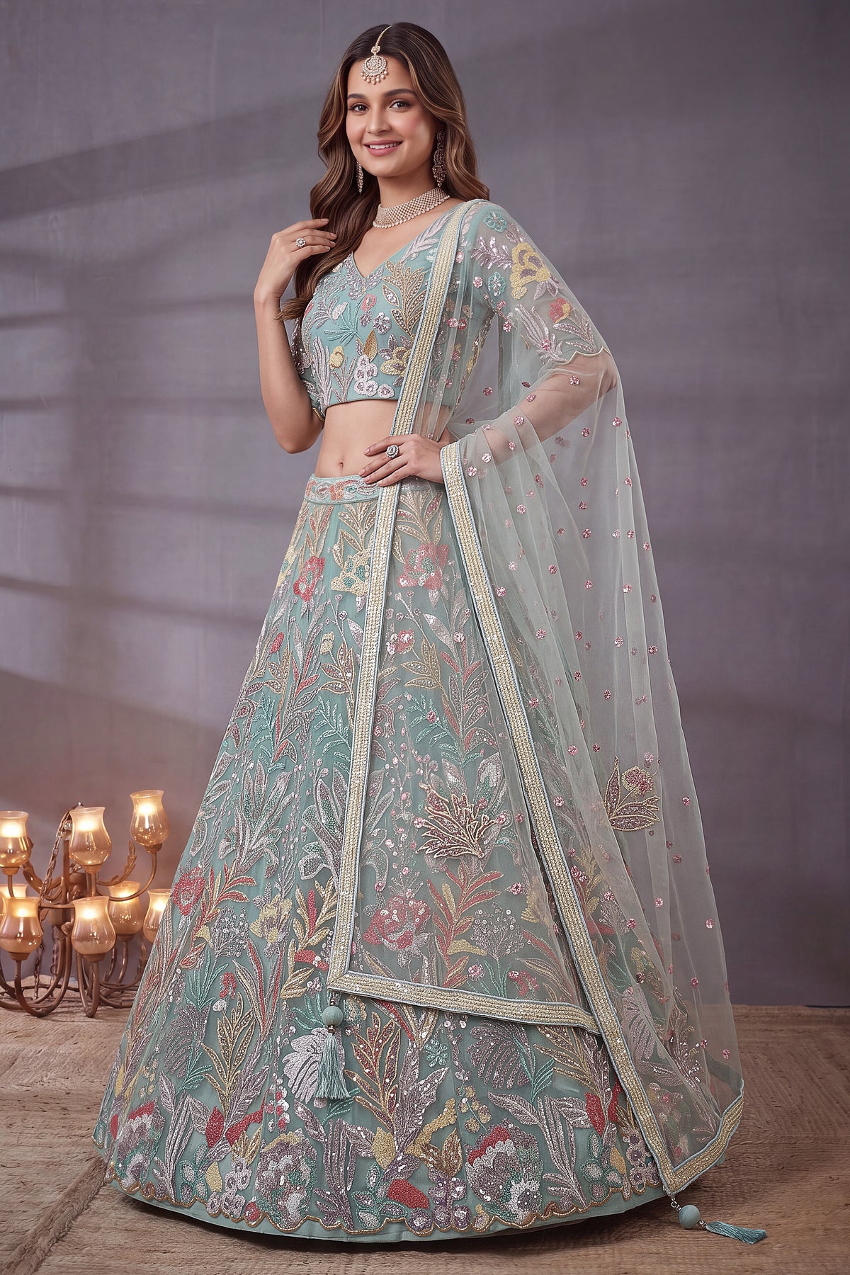 Ice Sky Blue Soft Net Lehenga Choli highlighted with Multi-Color Botanical Embroidery