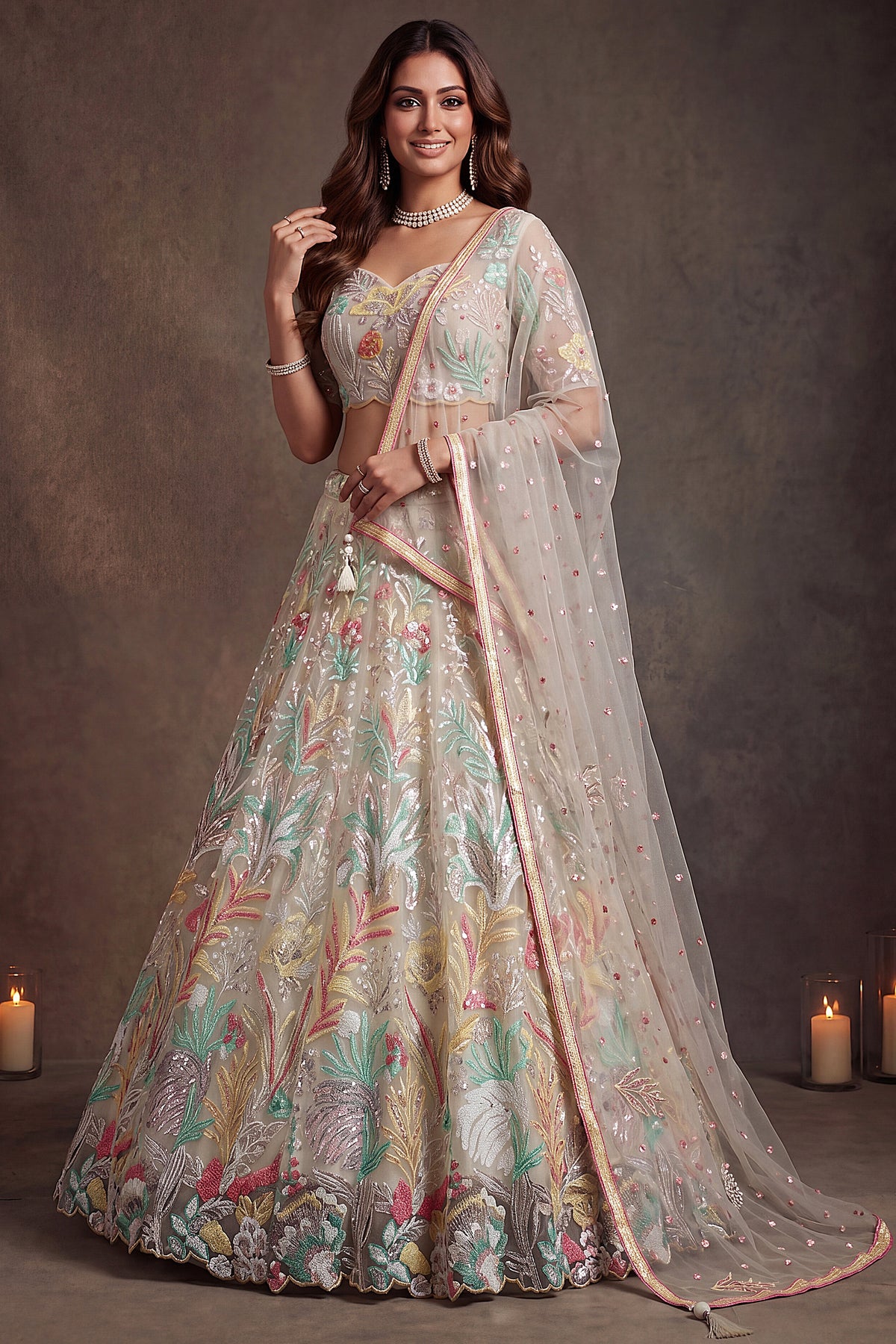 Pristine White Soft Net Lehenga Choli with Multi-Colored Floral Thread Embroidery