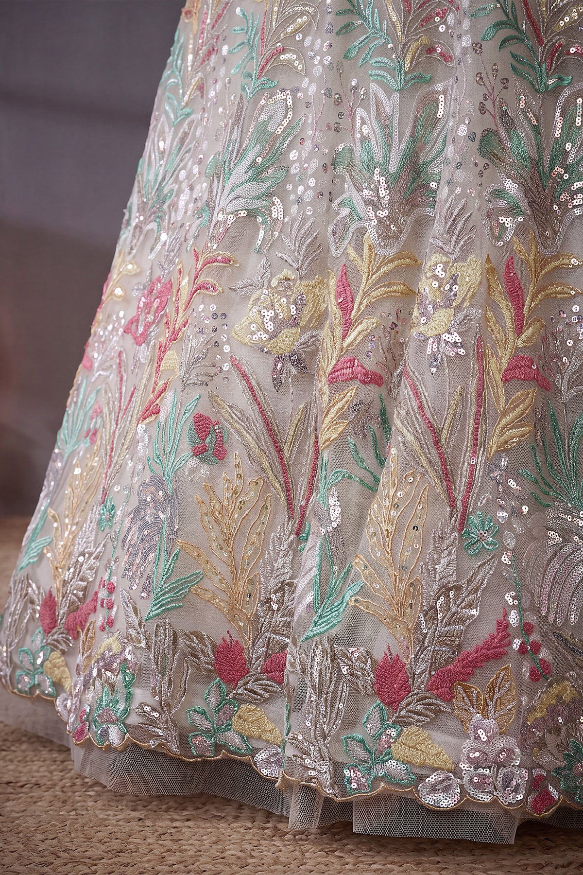 Pristine White Soft Net Lehenga Choli with Multi-Colored Floral Thread Embroidery