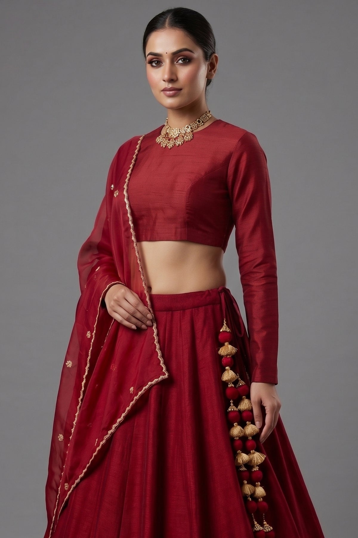 Close-up of Zardosi and diamond embroidery on the Maroon Matka Silk Bridal Lehenga