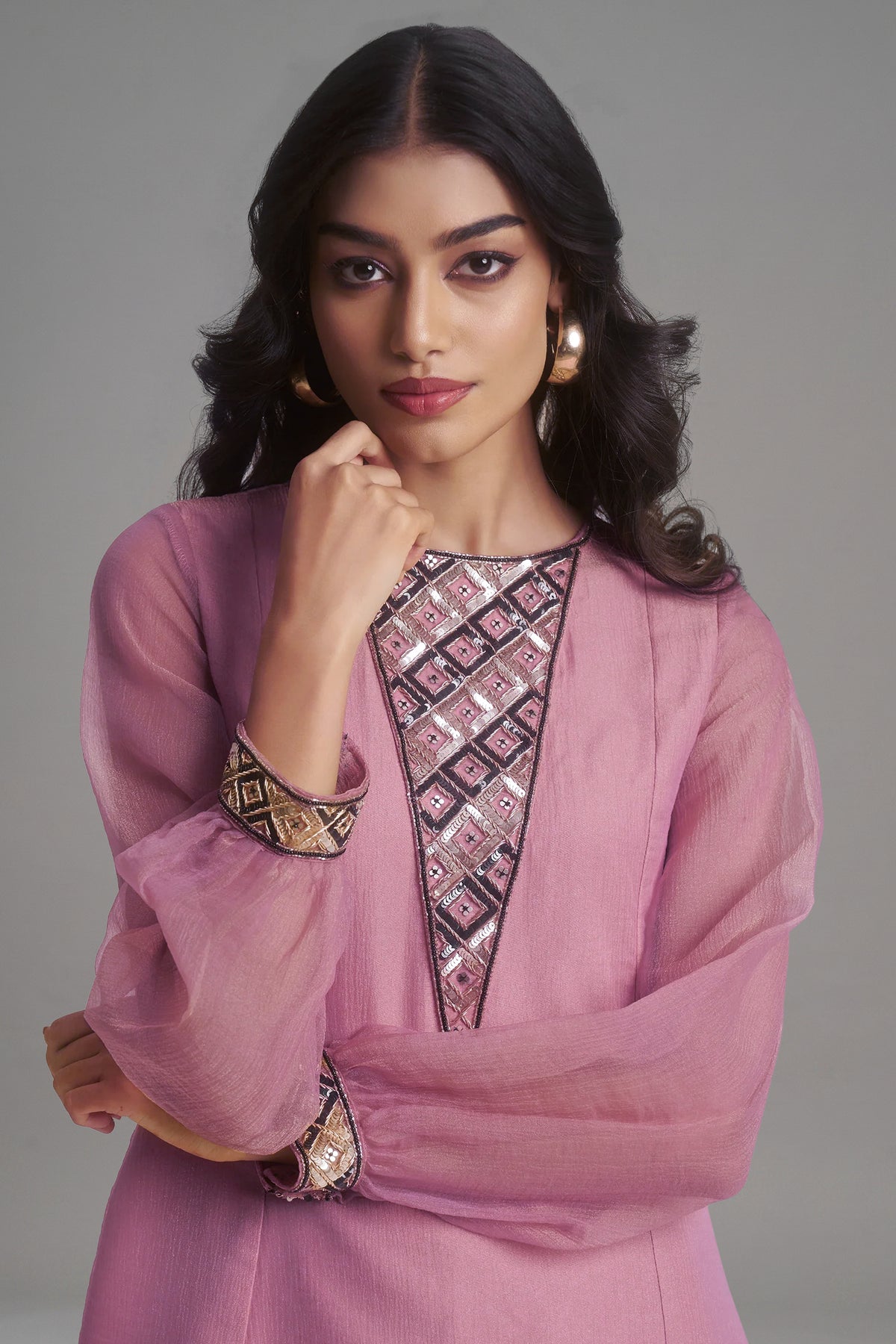 Close-up of high-definition sequins on the Rosewood Pink Tissue Sequinned Kurti with Pant