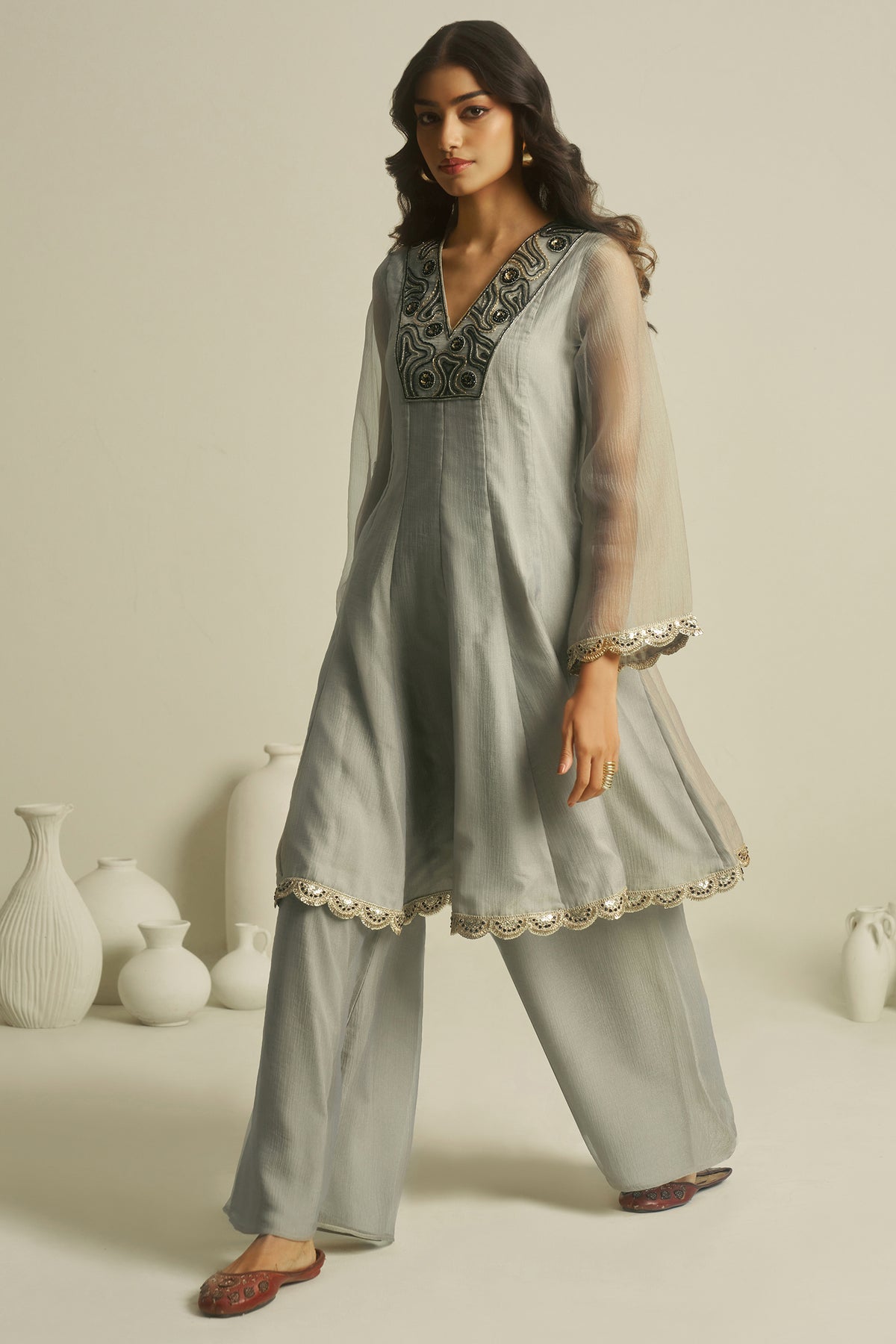 Dove Grey Tissue Sequinned Kurti with Bottom offering a majestic and structured drape