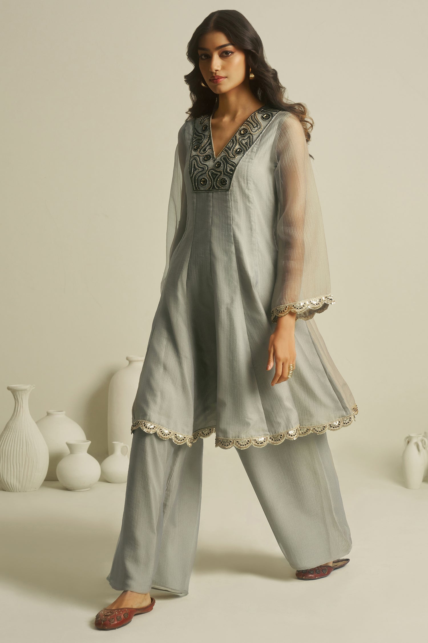 Dove Grey Tissue Sequinned Kurti with Bottom offering a majestic and structured drape
