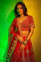 Red Raw Silk Heavy Bridal Lehenga with Peacock and Floral Motifs