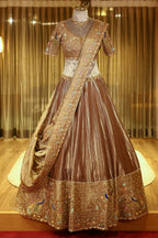 Chocolate Brown Munga Silk Woven Lehenga with Zardosi Beaded Work and Peacock Motif Broad Border - brown silk saree