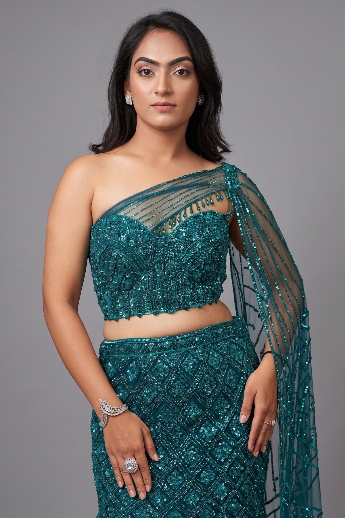 Teal Blue Net Embellishment Fish Cut Sequin Cutdana Work Lehenga with One Shoulder Cape Corset - blue net saree