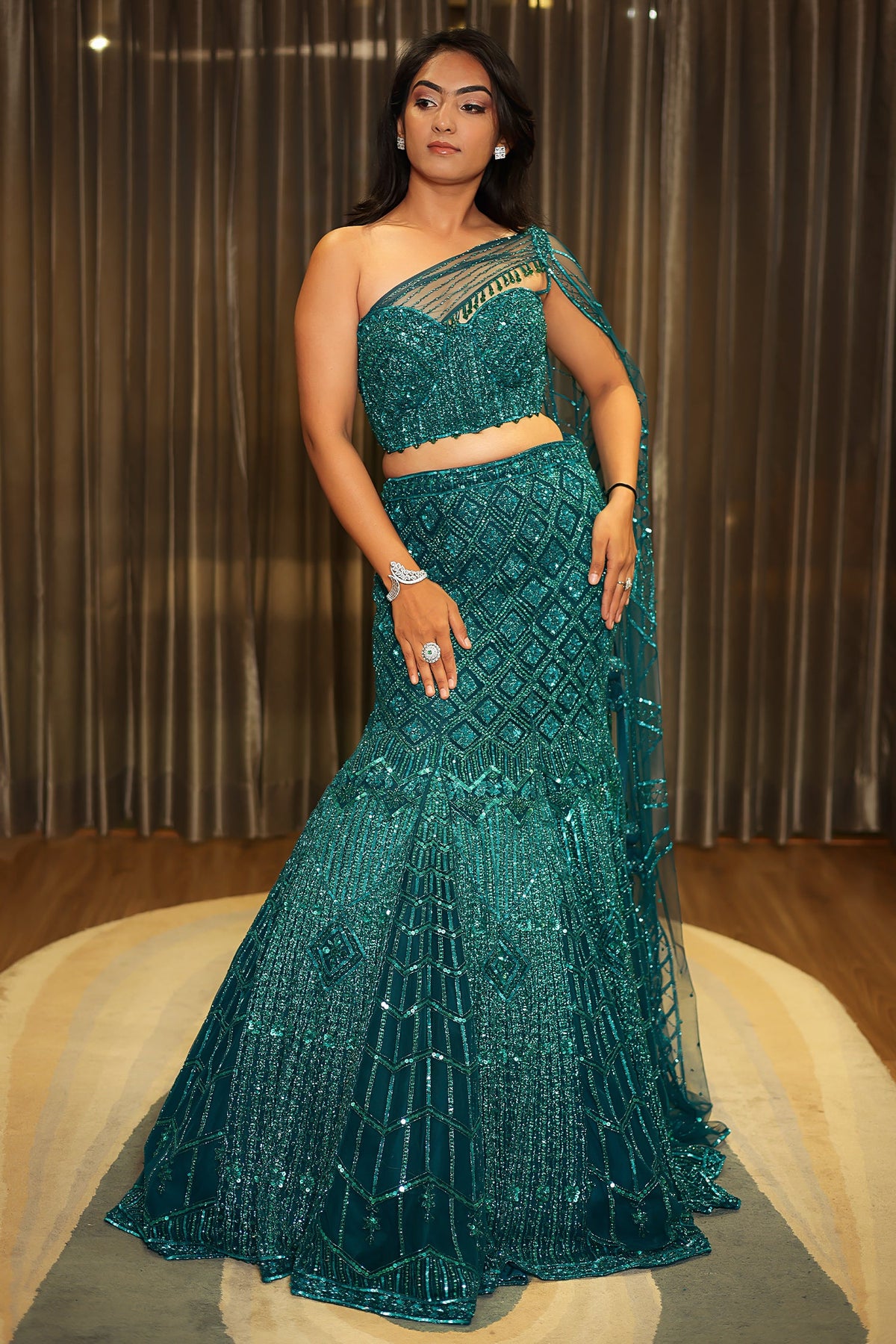 Teal Blue Net Embellishment Fish Cut Sequin Cutdana Work Lehenga with One Shoulder Cape Corset - blue net saree