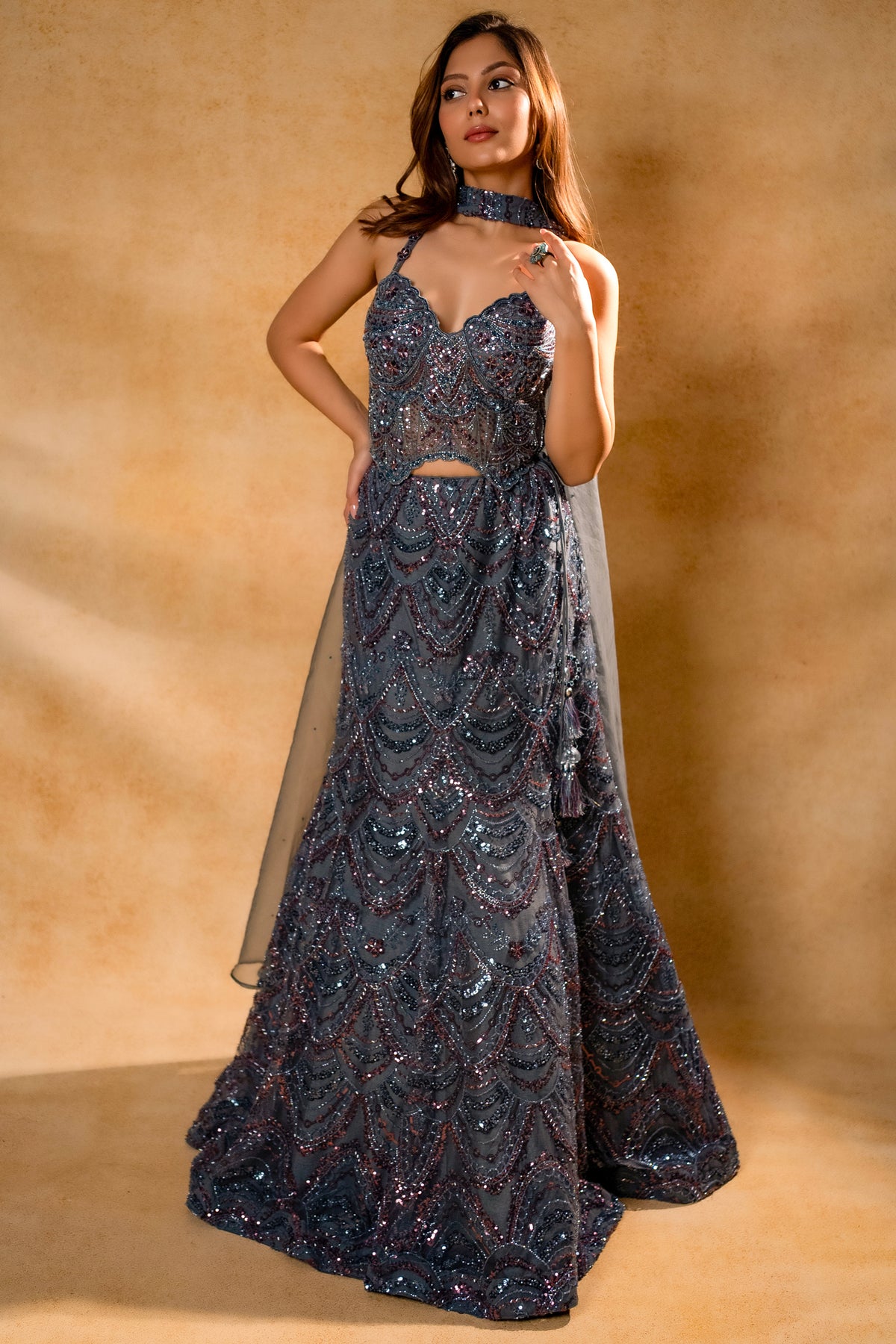 Grey Net Sequin Fish Cut Lehenga featuring a structured sweetheart neckline corset