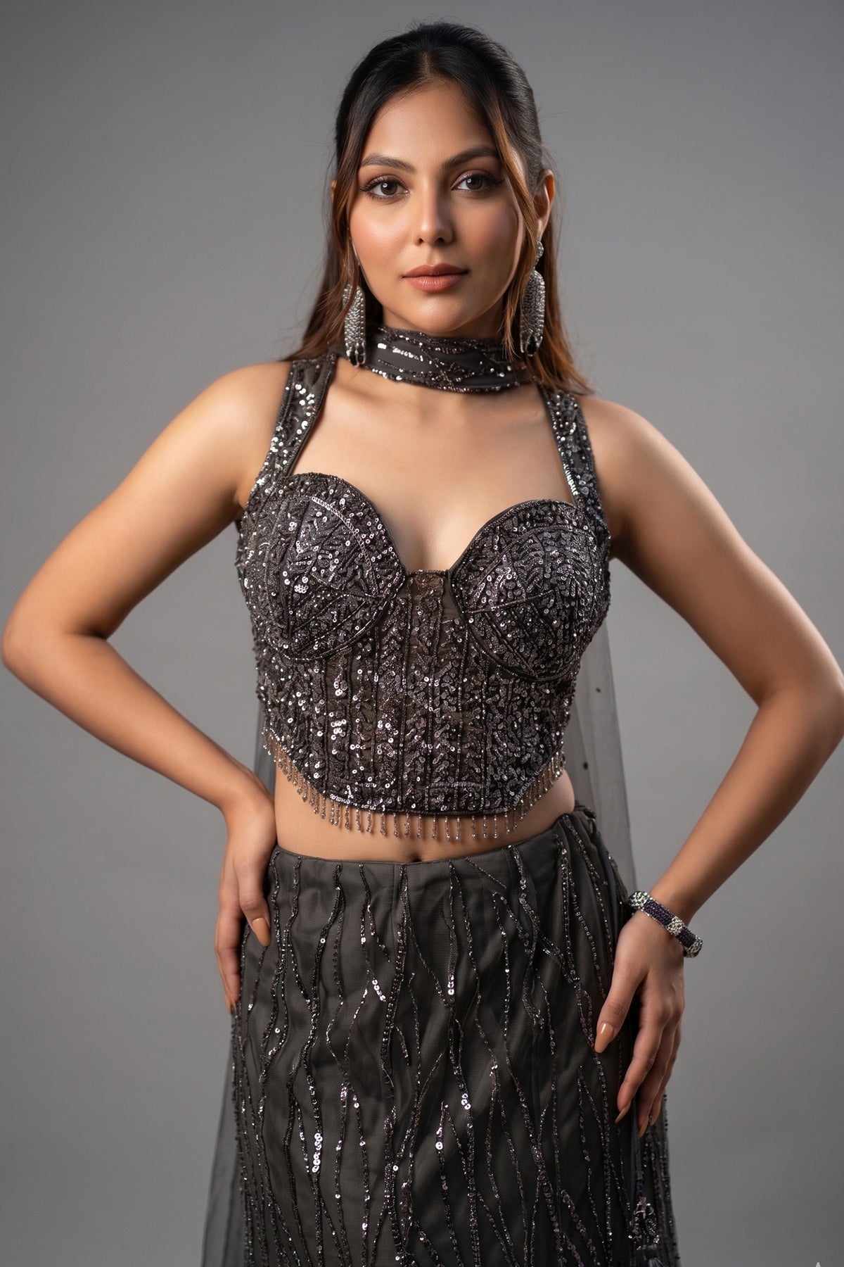 Close-up of tonal sequins and glass cutdana on the Dark Grey Net Sequin Lehenga