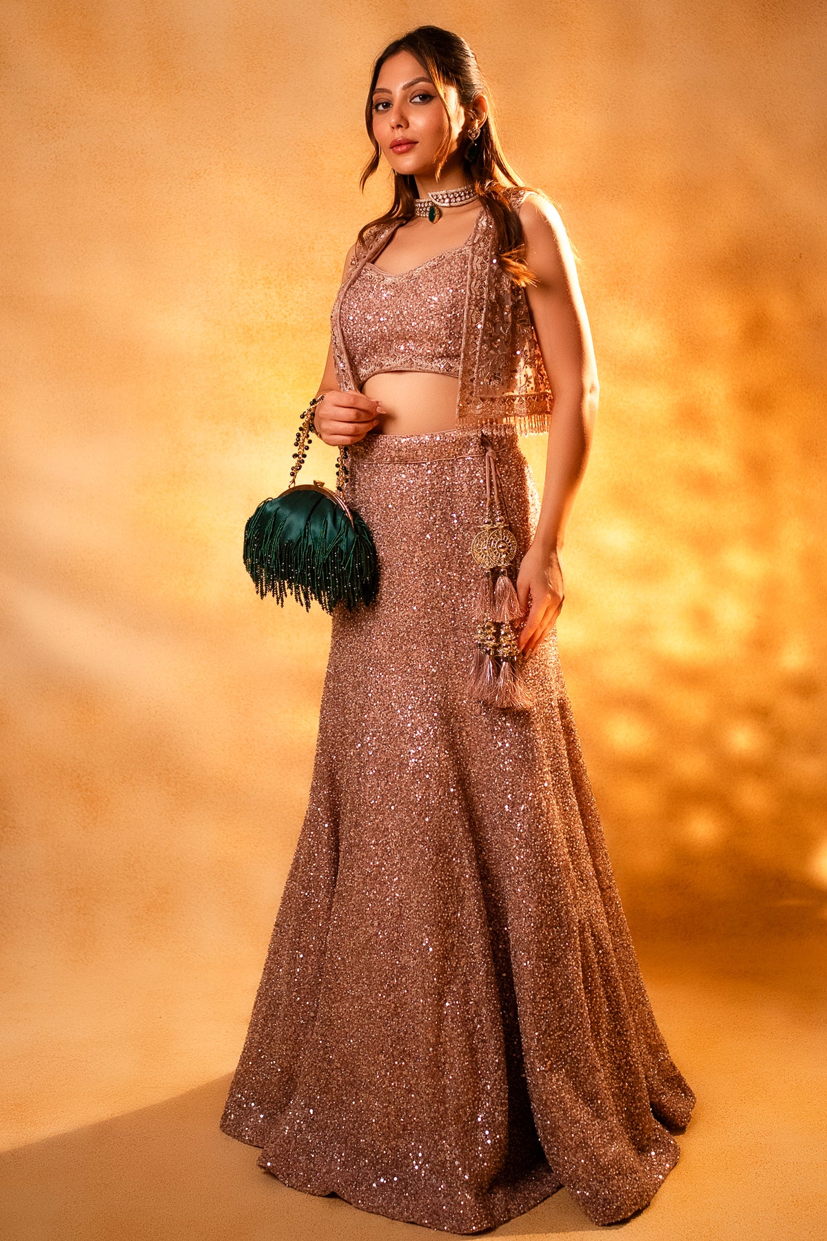 Dusty Pink Net Sequinned Fish Cut Lehenga featuring a sophisticated mermaid silhouette