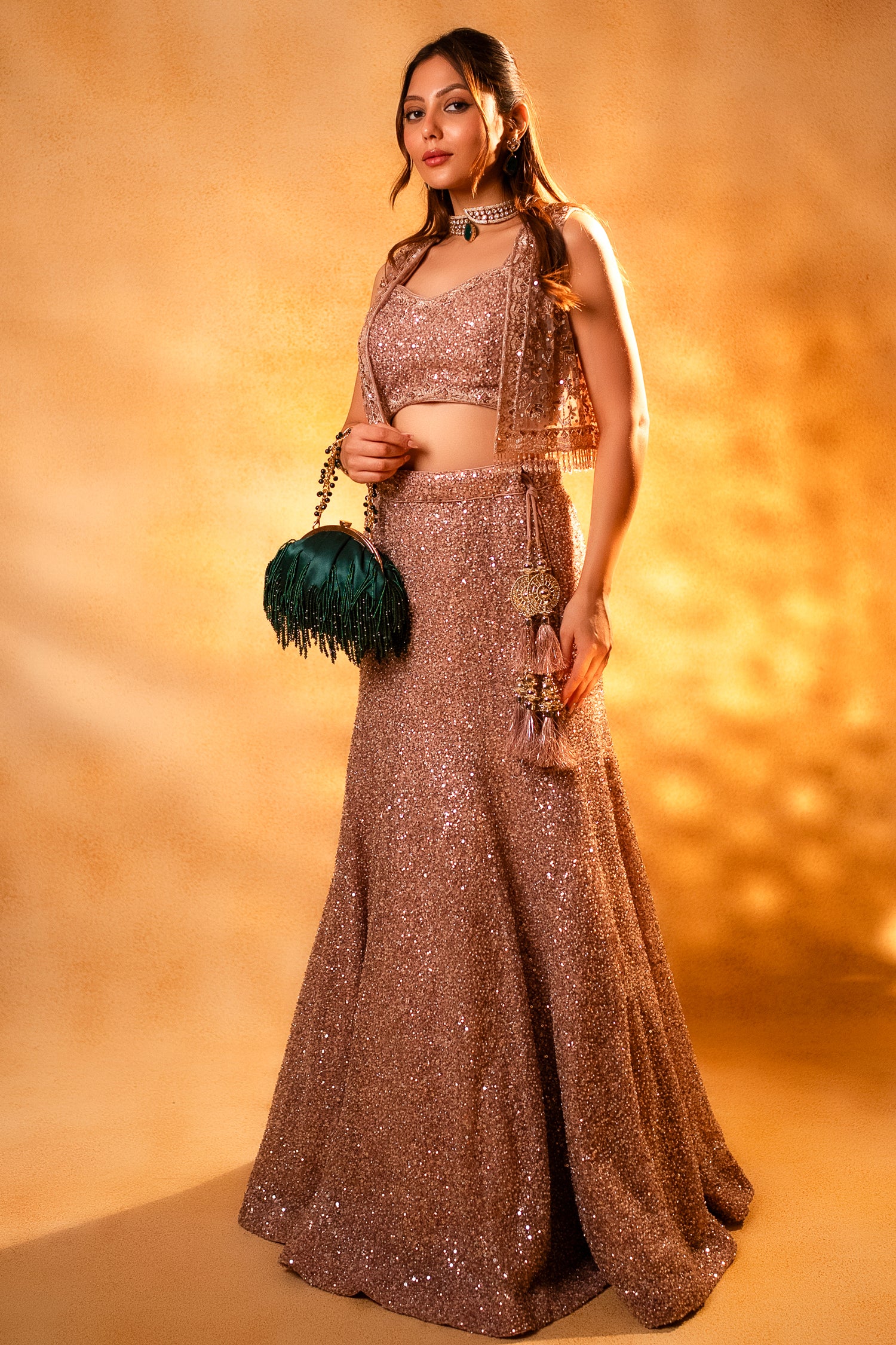Dusty Pink Net Sequinned Fish Cut Lehenga featuring a sophisticated mermaid silhouette