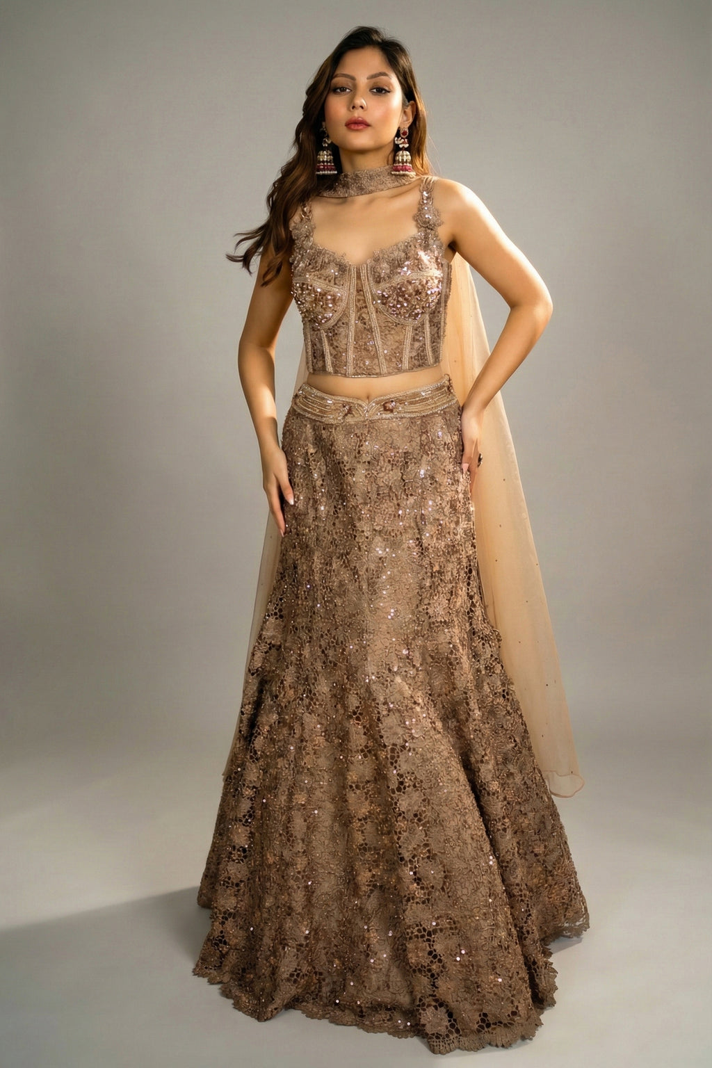 Rose Gold Net Sequinned Fish Cut Lehenga with Corset Blouse - Front View