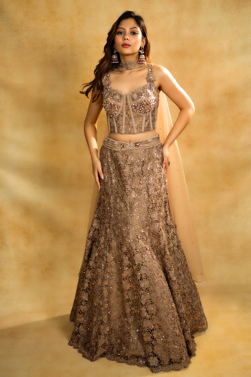 Designer Rose Gold Net Sequinned Fish Cut Lehenga with Corset Blouse for high-glam occasions