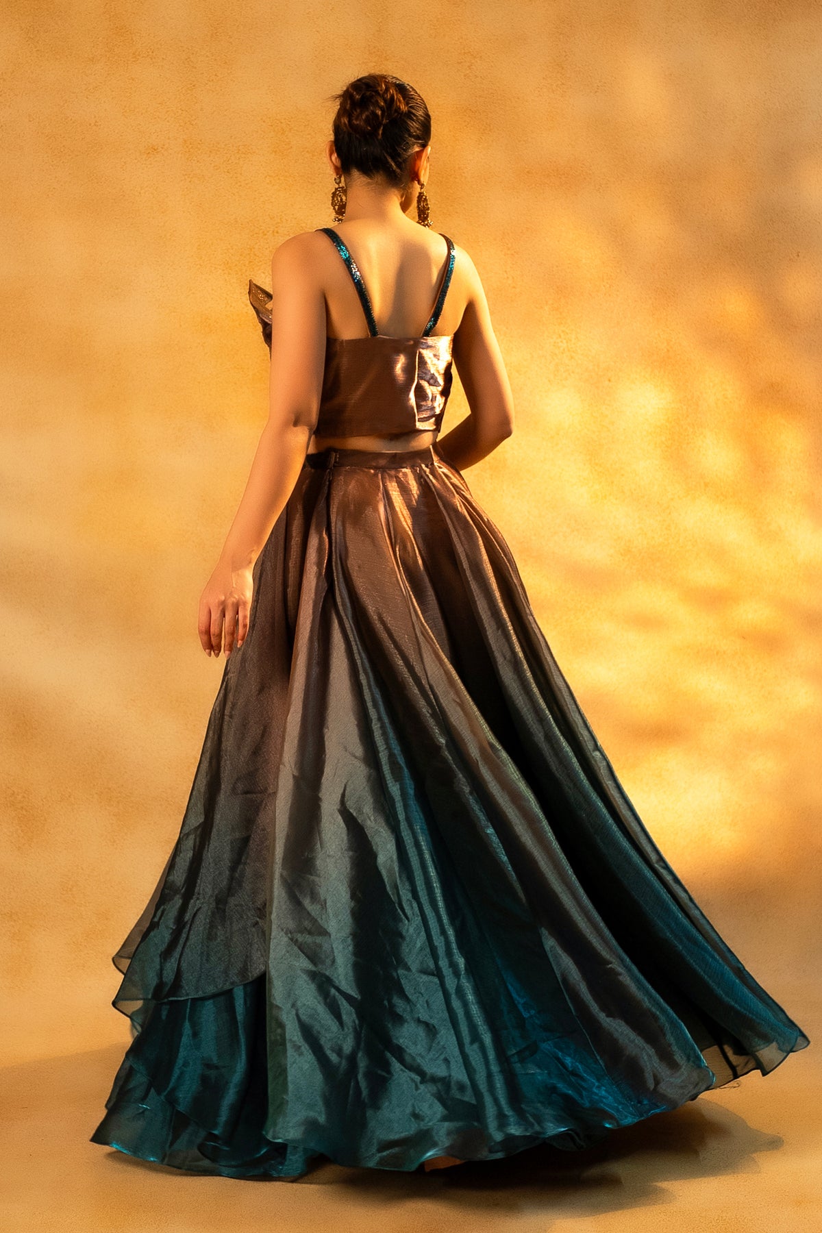 Brown and Prussian Blue Glass Organza Asymmetrical Lehenga featuring an architectural sequin blouse