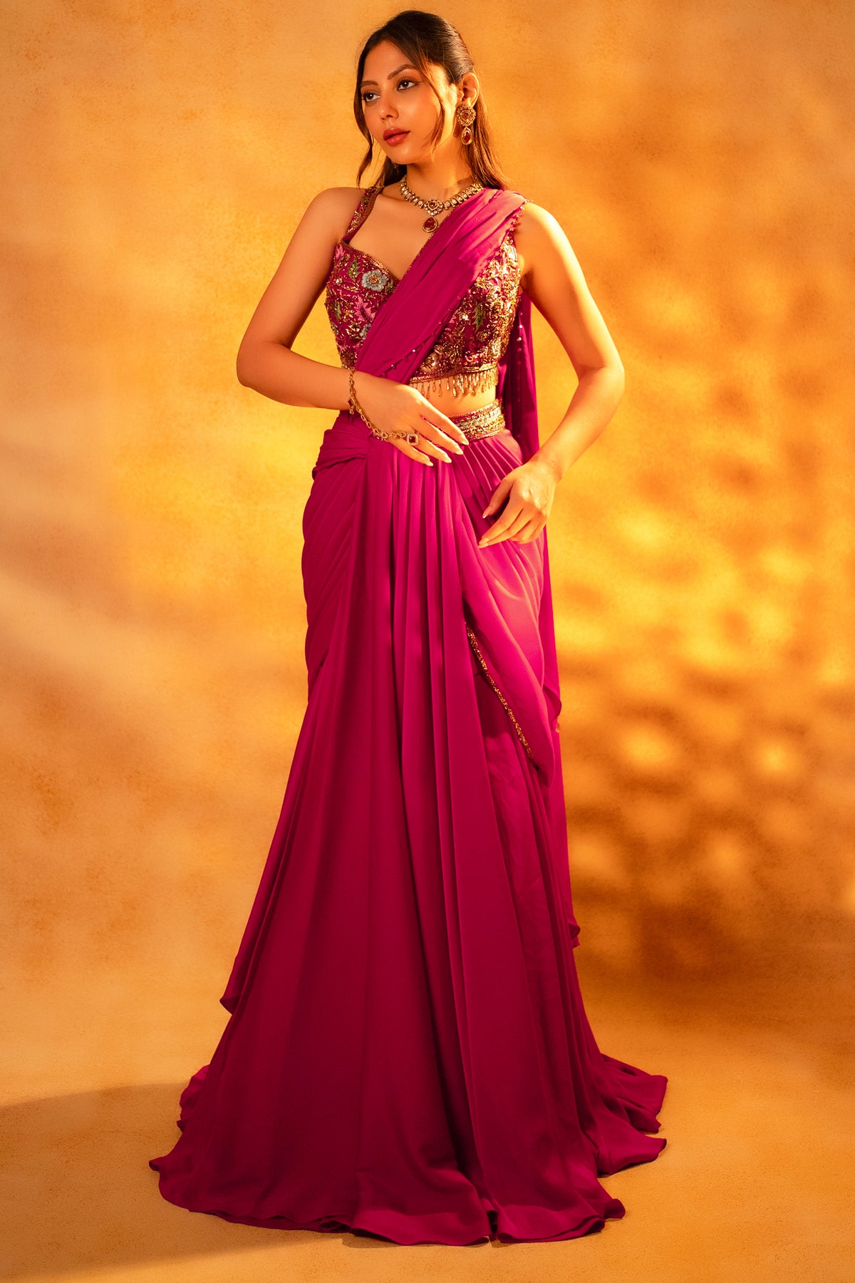 Pink Crepe Satin Draped Lehenga featuring a pre-stitched silhouette and attached dupatta