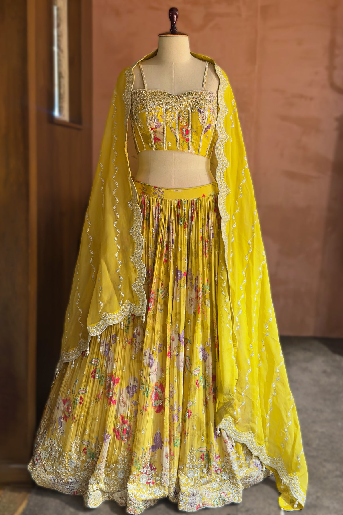 Lime Yellow Chiffon Chinon Silk Lehenga featuring a structured corset-style blouse
