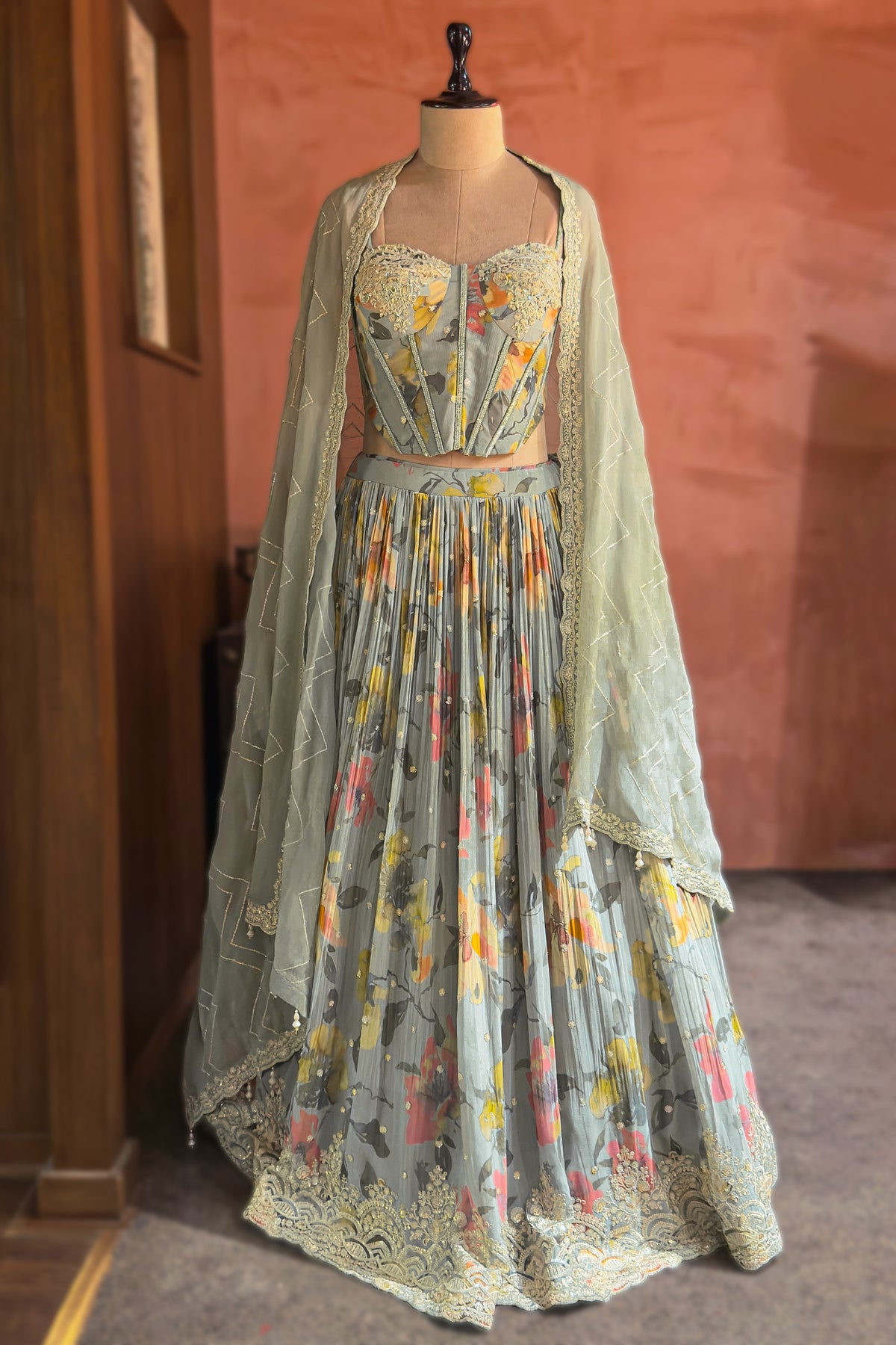 Light Sage Green Corset Lehenga featuring a voluminous Chinon Chiffon skirt